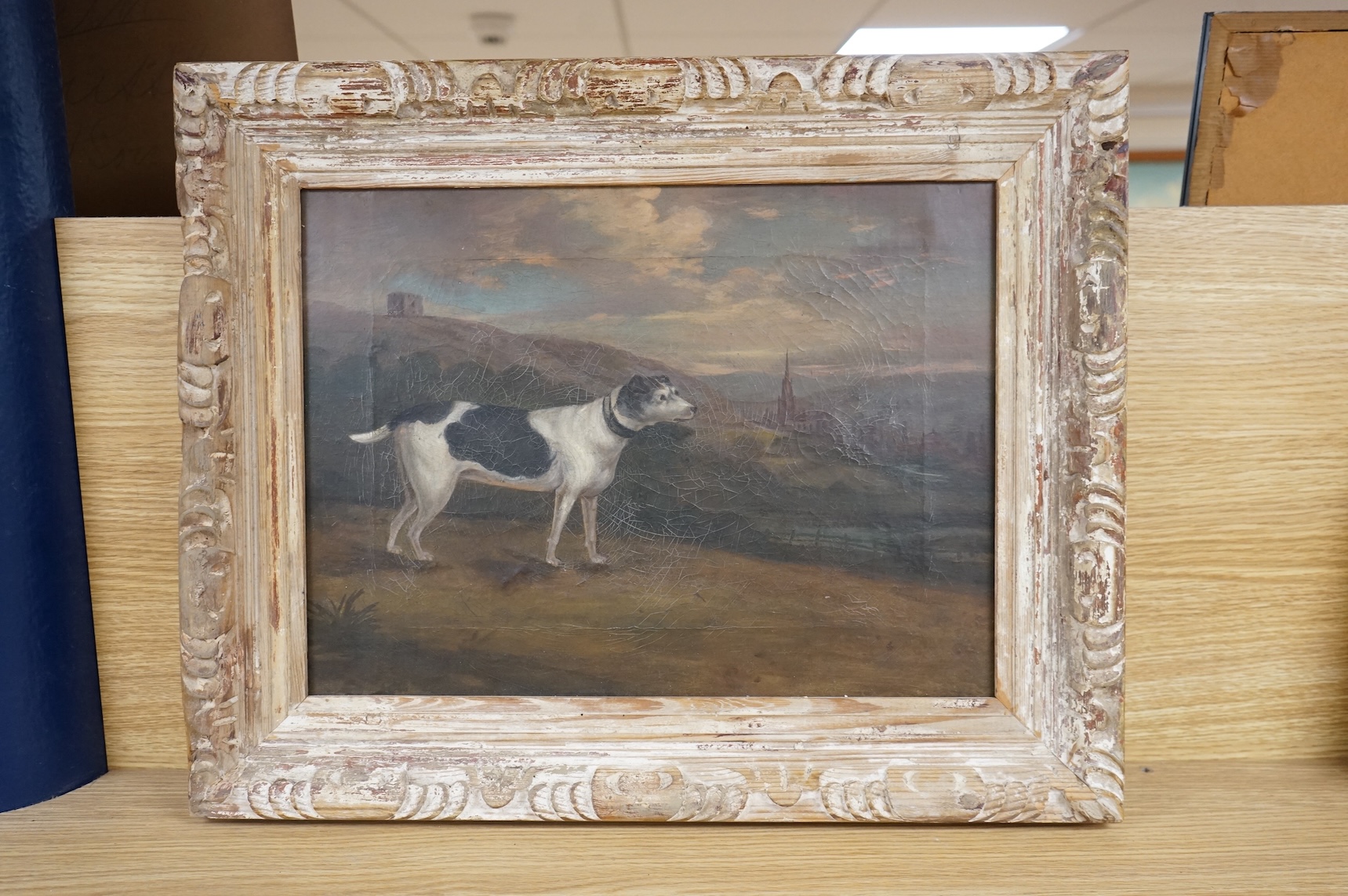 Thomas Hawley (19th. C), Study of a hound with view of Rawmarsh, South Yorkshire to the distance, signed verso, oil on canvas, 29 x 38cm